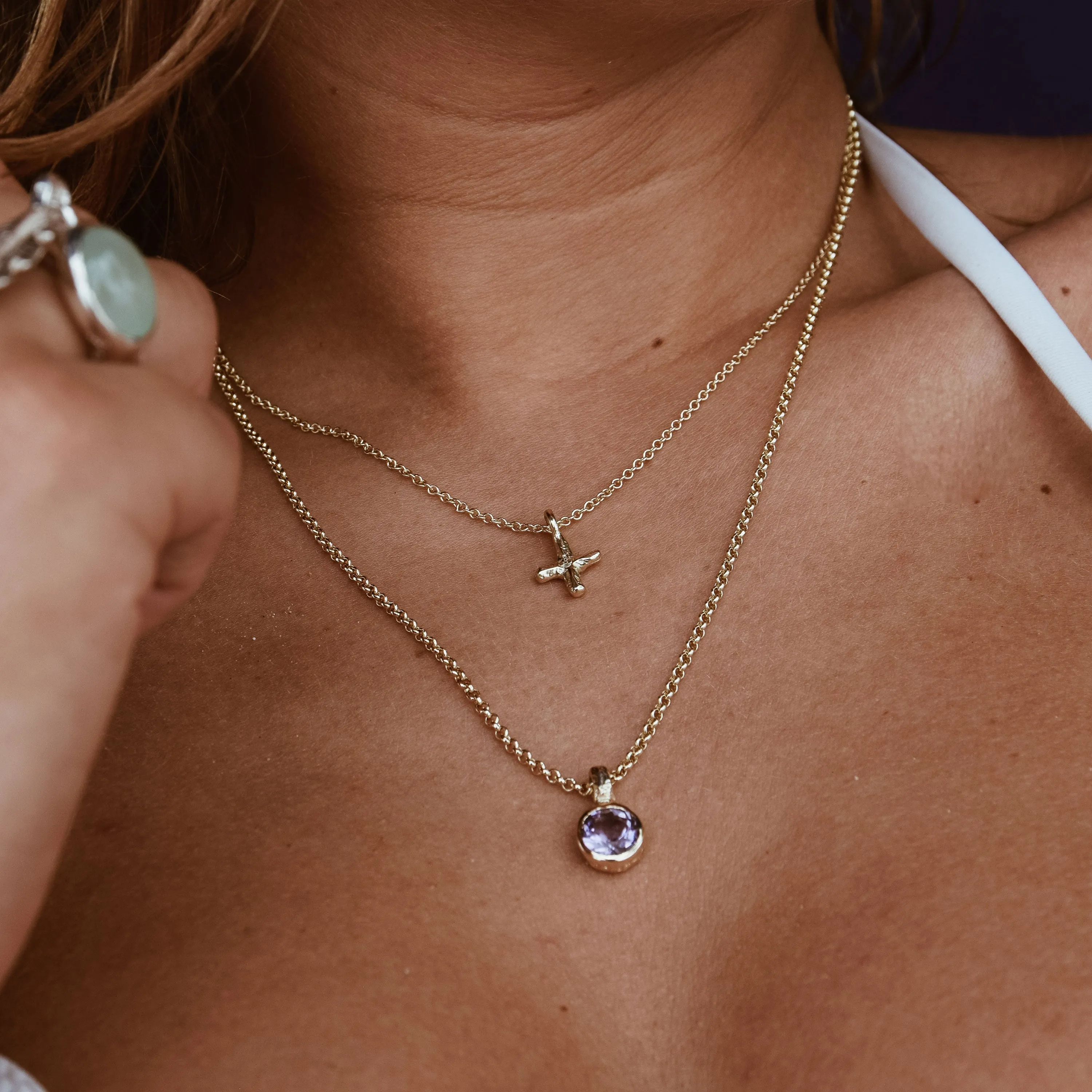 Buy the Amethysts Baby Treasure Gold Necklace from British Jewellery Designer Daniella Draper
